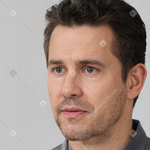 Neutral white adult male with short  brown hair and brown eyes