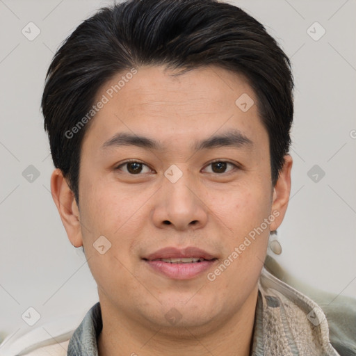 Joyful asian young-adult male with short  brown hair and brown eyes