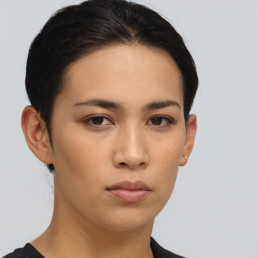 Neutral asian young-adult female with short  brown hair and brown eyes