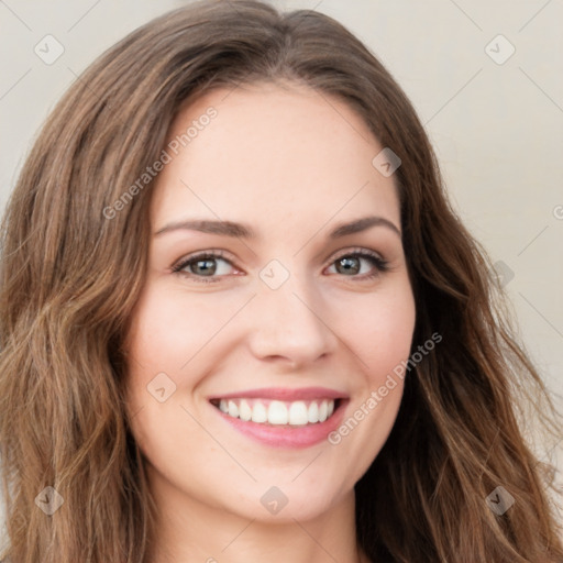 Joyful white young-adult female with long  brown hair and green eyes