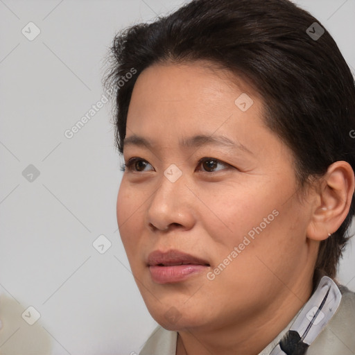 Joyful white adult female with short  brown hair and brown eyes