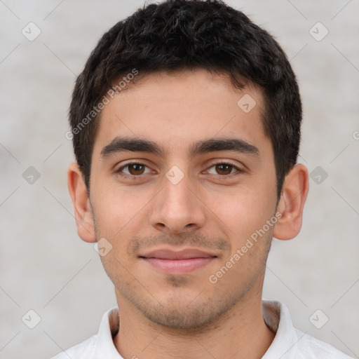 Joyful white young-adult male with short  black hair and brown eyes