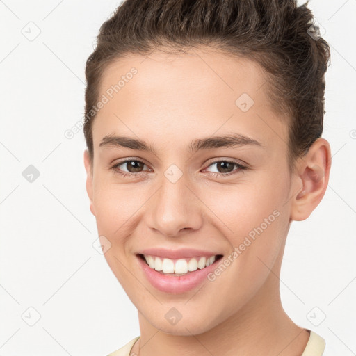 Joyful white young-adult female with short  brown hair and brown eyes