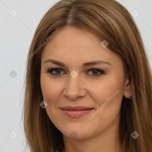 Joyful white young-adult female with long  brown hair and brown eyes