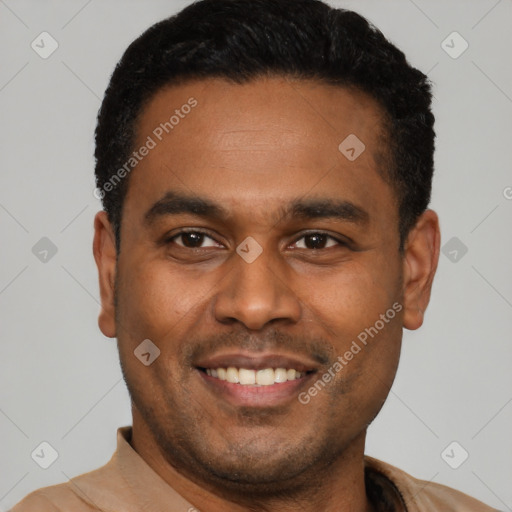 Joyful latino young-adult male with short  black hair and brown eyes