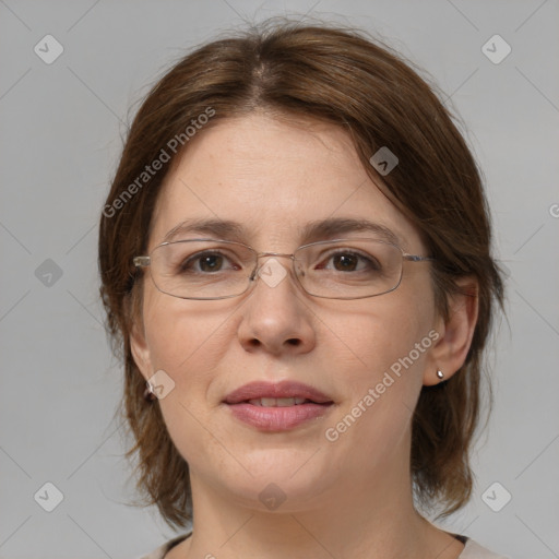 Joyful white adult female with medium  brown hair and grey eyes