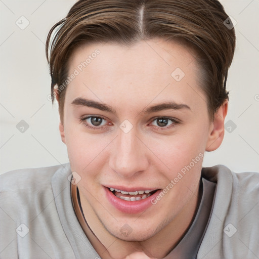 Joyful white young-adult female with short  brown hair and grey eyes