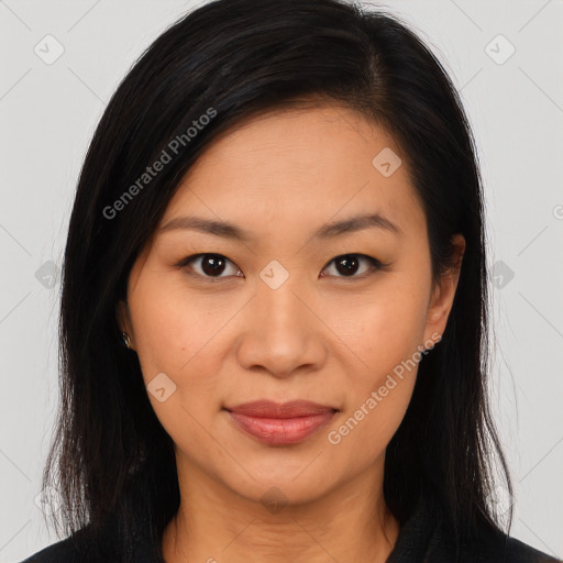 Joyful latino young-adult female with long  brown hair and brown eyes