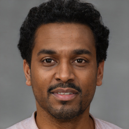 Neutral latino adult male with short  black hair and brown eyes