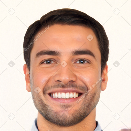 Joyful white young-adult male with short  black hair and brown eyes