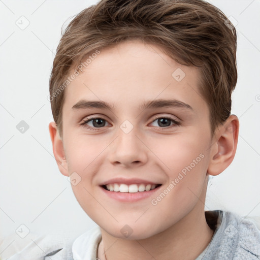 Joyful white child male with short  brown hair and brown eyes