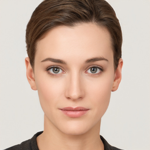 Neutral white young-adult female with short  brown hair and brown eyes