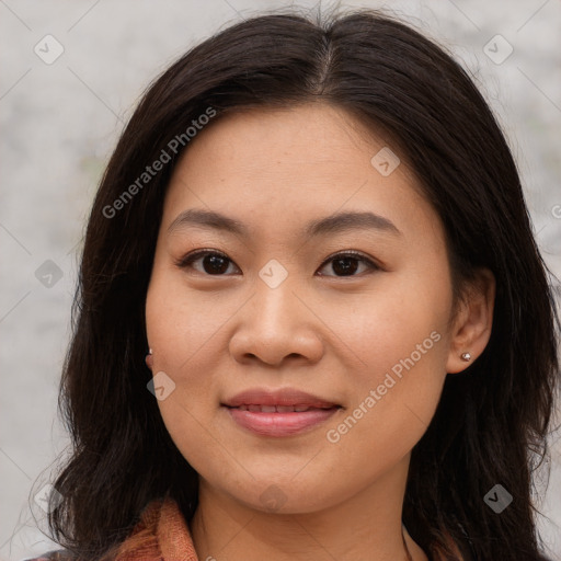 Joyful asian young-adult female with long  brown hair and brown eyes