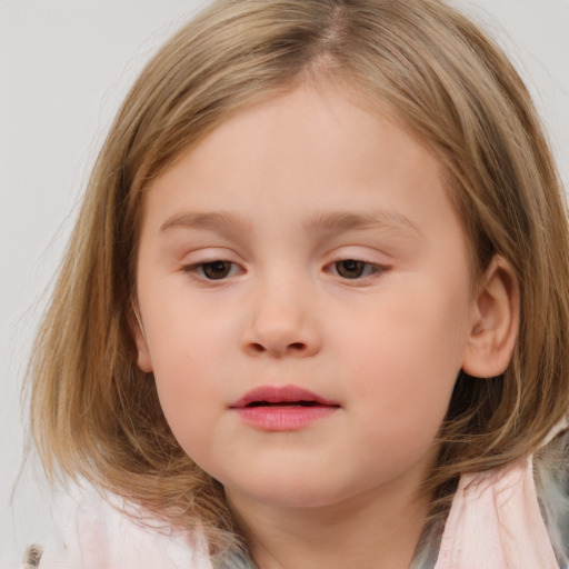 Neutral white child female with medium  brown hair and brown eyes