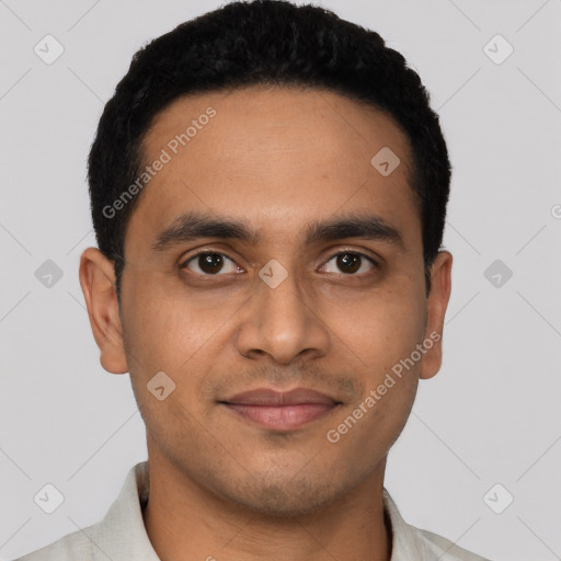 Joyful latino young-adult male with short  black hair and brown eyes