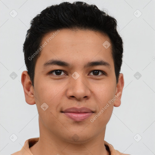 Joyful latino young-adult male with short  brown hair and brown eyes