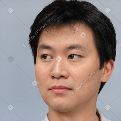 Neutral asian young-adult male with short  black hair and brown eyes