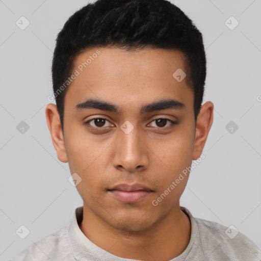 Neutral latino young-adult male with short  black hair and brown eyes