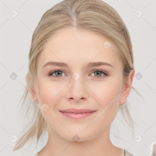 Joyful white young-adult female with medium  brown hair and blue eyes