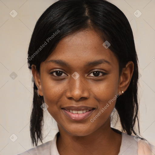 Joyful black young-adult female with medium  black hair and brown eyes