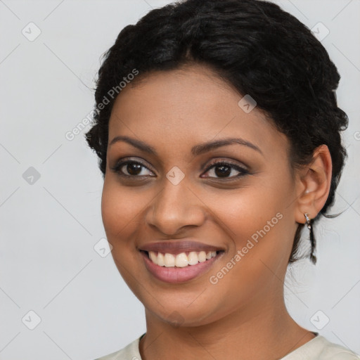 Joyful latino young-adult female with short  brown hair and brown eyes