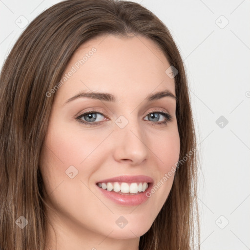 Joyful white young-adult female with long  brown hair and green eyes