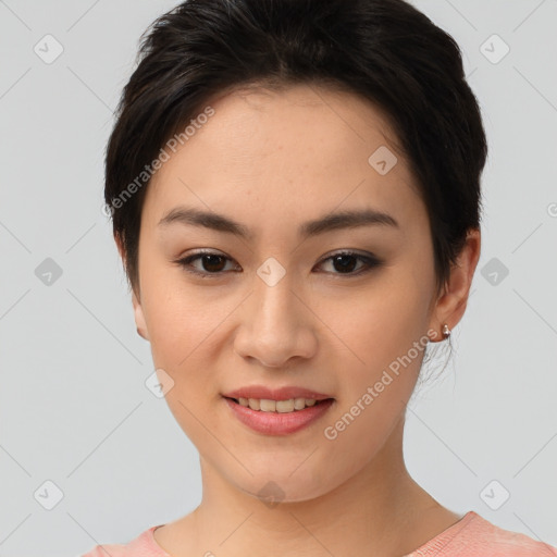 Joyful asian young-adult female with short  brown hair and brown eyes