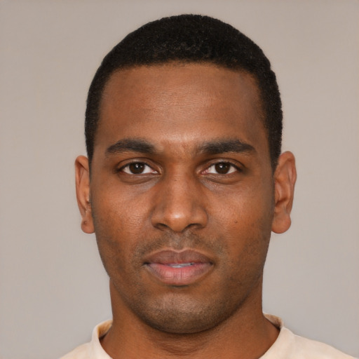 Neutral black young-adult male with short  black hair and brown eyes