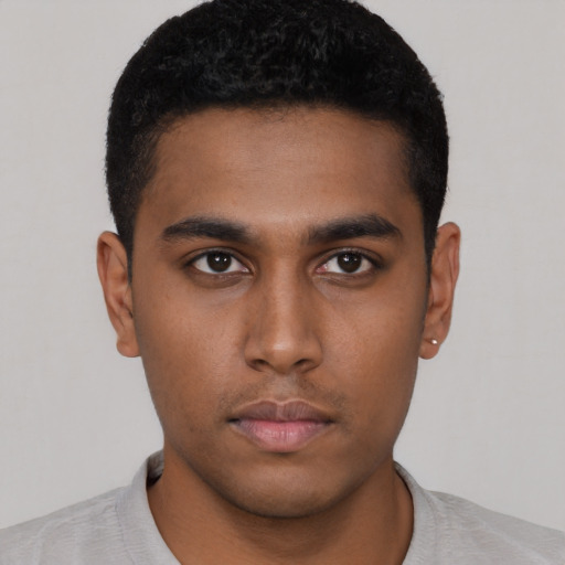 Neutral black young-adult male with short  black hair and brown eyes