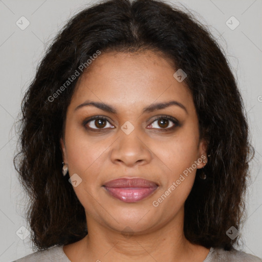 Joyful black young-adult female with medium  brown hair and brown eyes