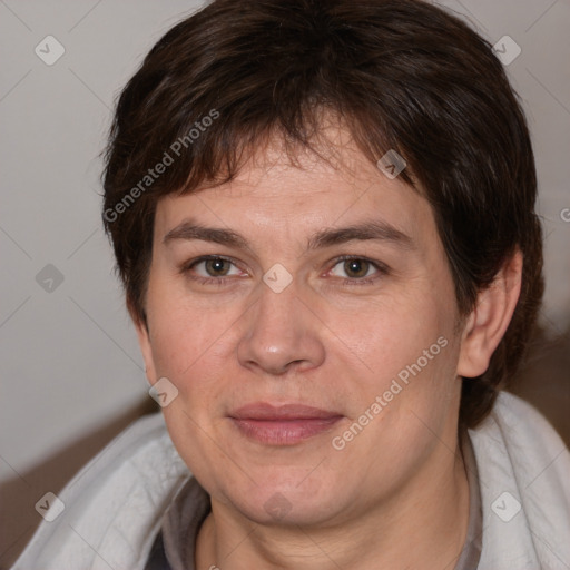 Joyful white adult female with medium  brown hair and brown eyes