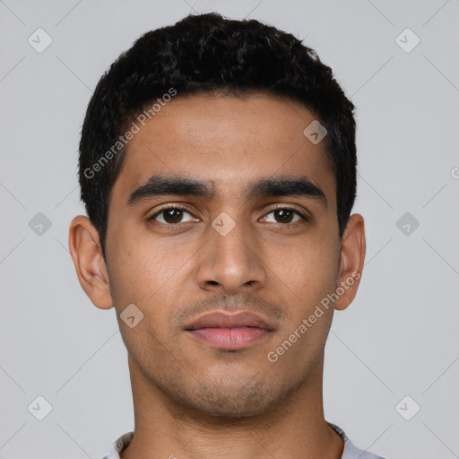 Neutral latino young-adult male with short  black hair and brown eyes