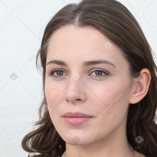 Neutral white young-adult female with long  brown hair and grey eyes