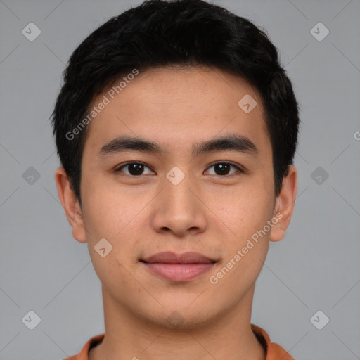 Joyful asian young-adult male with short  brown hair and brown eyes