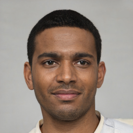 Neutral black young-adult male with short  black hair and brown eyes