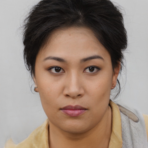 Neutral asian young-adult female with short  brown hair and brown eyes