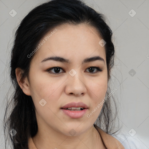 Joyful latino young-adult female with medium  black hair and brown eyes