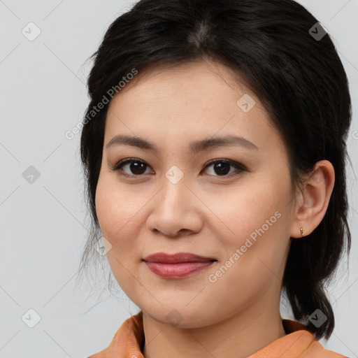 Joyful asian young-adult female with medium  brown hair and brown eyes