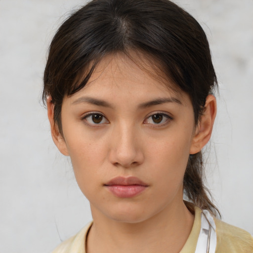 Neutral white young-adult female with medium  brown hair and brown eyes