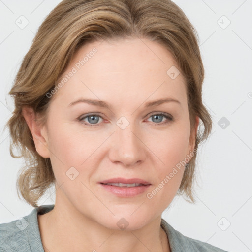 Joyful white young-adult female with medium  brown hair and blue eyes