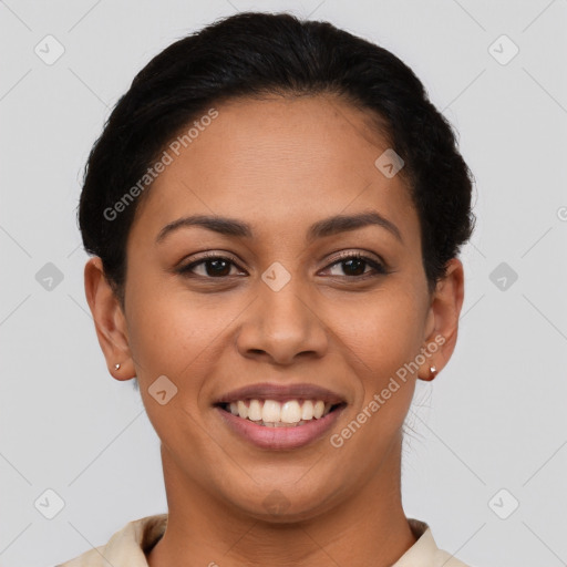 Joyful latino young-adult female with short  brown hair and brown eyes