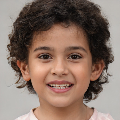 Joyful white child female with medium  brown hair and brown eyes