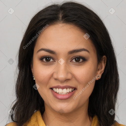 Joyful latino young-adult female with long  brown hair and brown eyes