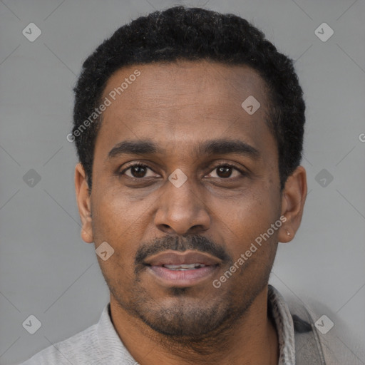 Neutral latino adult male with short  black hair and brown eyes