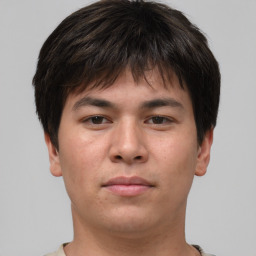 Neutral asian young-adult male with short  brown hair and brown eyes