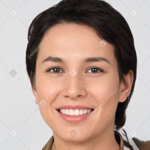 Joyful white young-adult female with short  brown hair and brown eyes