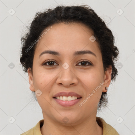 Joyful latino young-adult female with short  brown hair and brown eyes