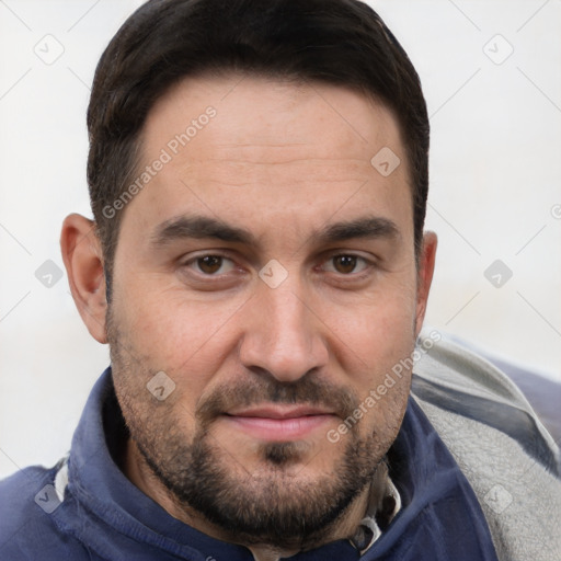 Joyful white adult male with short  brown hair and brown eyes