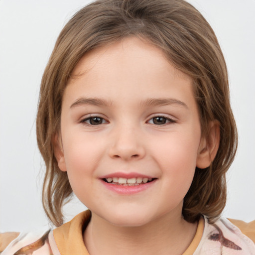 Joyful white child female with medium  brown hair and brown eyes