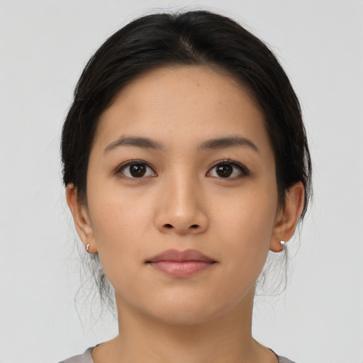 Neutral asian young-adult female with medium  black hair and brown eyes